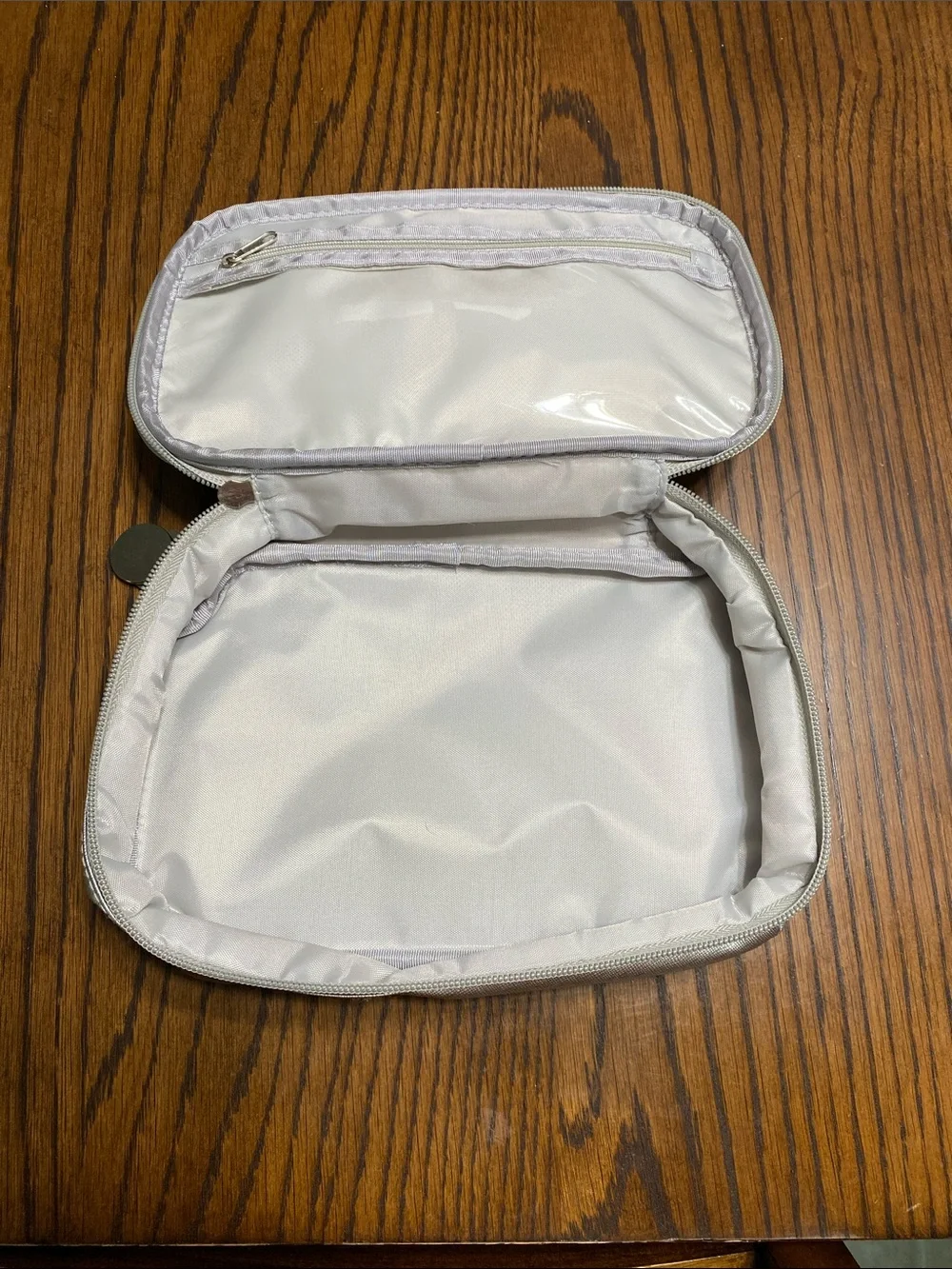 *New* Rodan + Fields dual-compartment travel makeup organizer